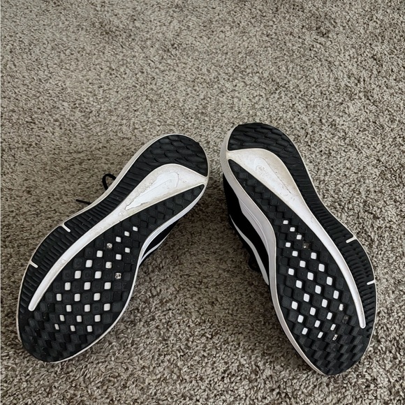 Nike Black Athletic Running Shoes with White Swoosh